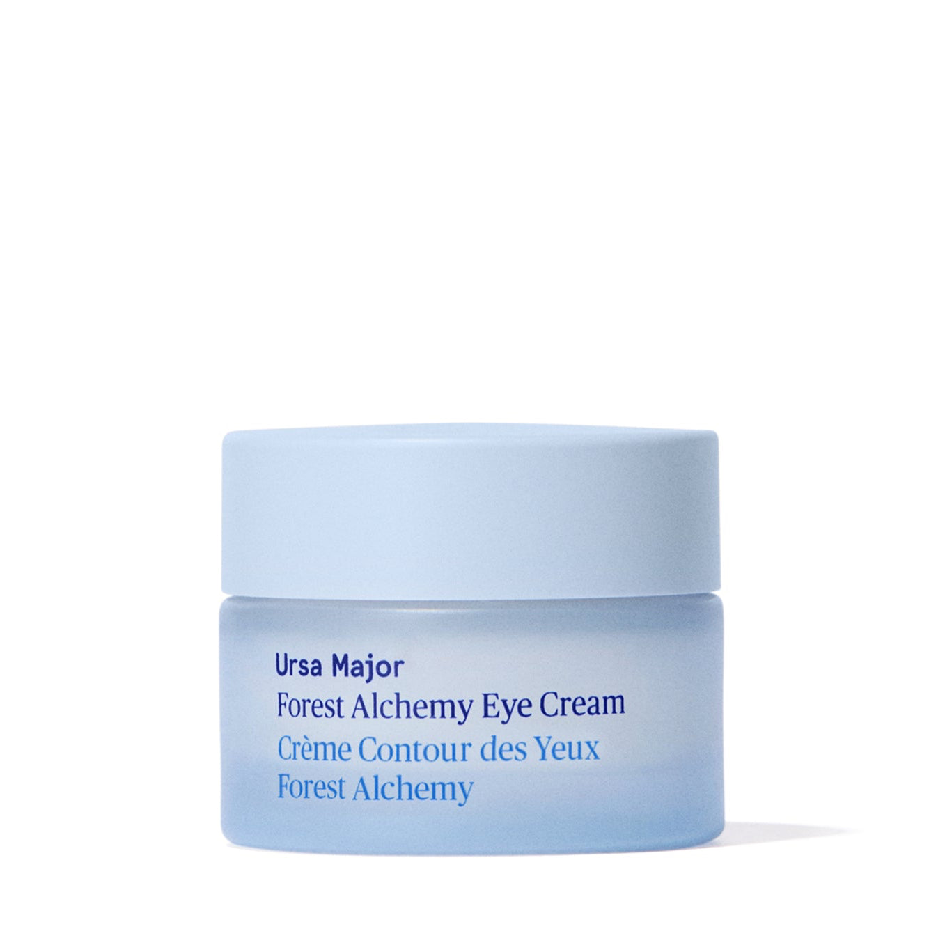 Blue jar of Ursa Major Forest Alchemy Eye Cream on a white background