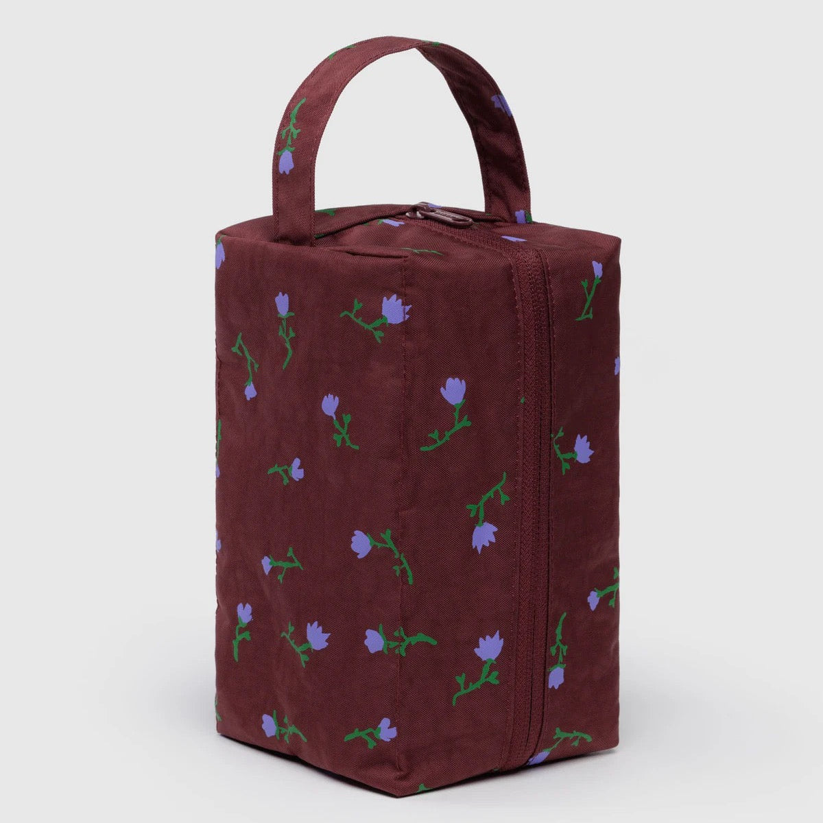 Brown bag with floral patterns on a white background