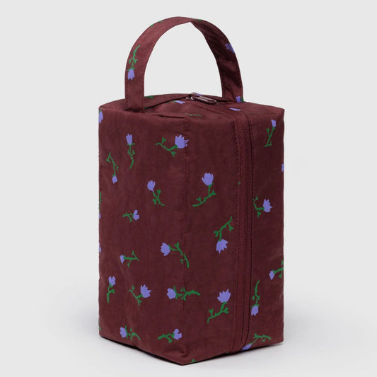 Brown bag with floral patterns on a white background